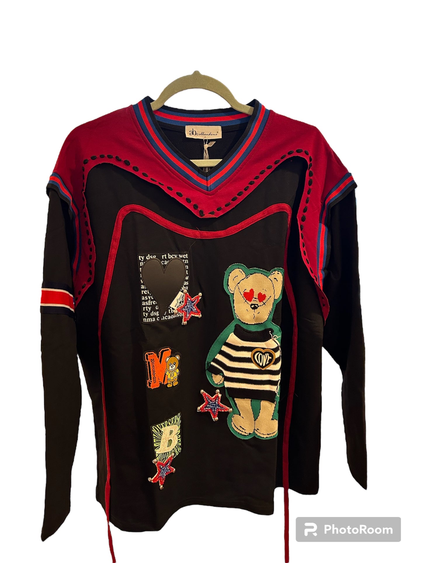 Unique design sweatshirt with bear patches and more