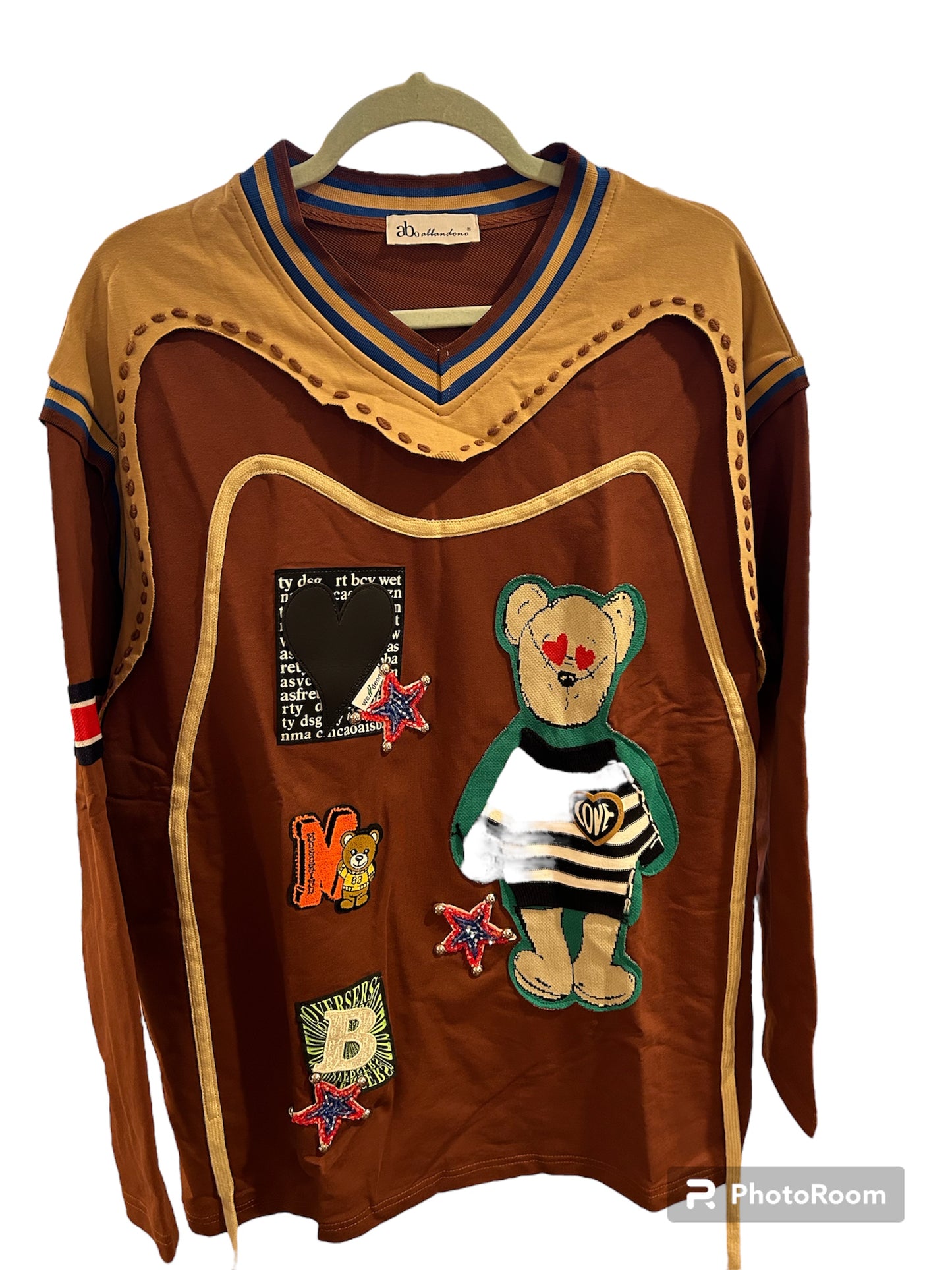 Unique design sweatshirt with bear patches and more